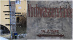 Abb. 1: Zeugnis der Erinnerung an das Hochwasser von 1572: Die Hochwassermarken sind am ehemaligen Wasserturm im oberösterreichischem Steyr im Bereich des Zusammenflusses von Steyr und Enns angebracht. Detail: Der höchste eingetragene Hochwasserstand steht für das Jahr 1572. 